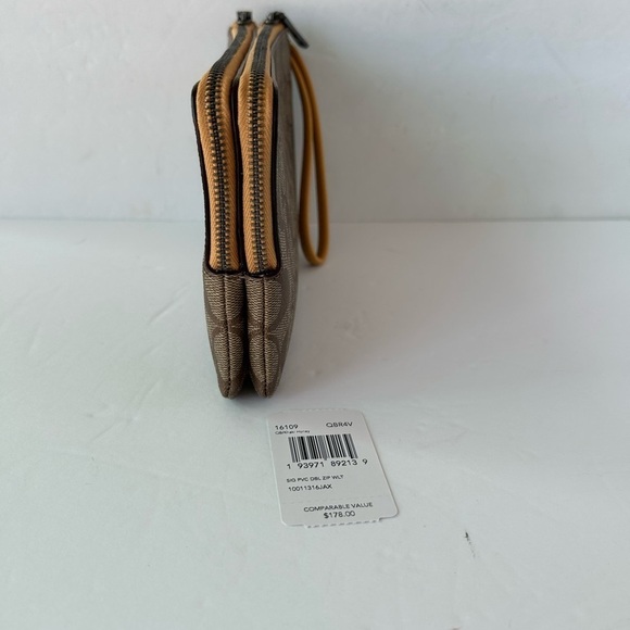 Coach NWT Wristlet Signature Print With Yellow LeatherStrap and zipper - Picture 2 of 10
